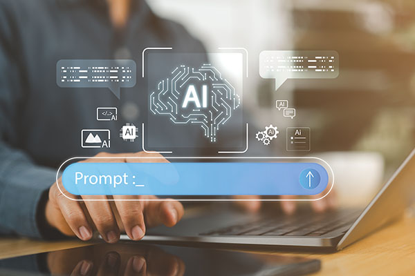 Hombre interactuando con un chatbot de IA en una computadora portátil, lo que representa inteligencia artificial, IA generativa, asistentes virtuales y creación de contenido inteligente en tecnología multimedia moderna.