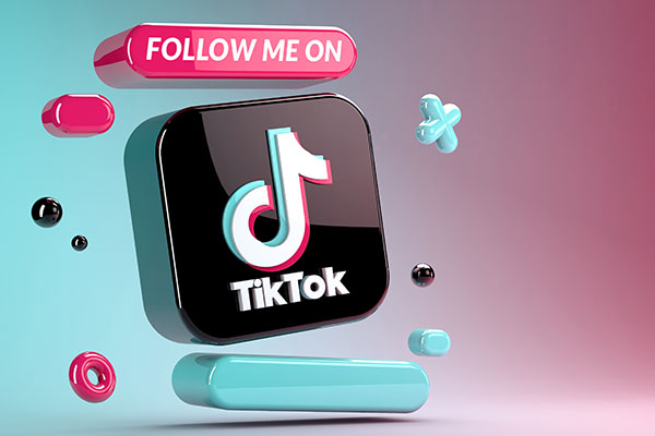 Representación 3D del icono de la app TikTok sobre un fondo degradado azul y rojo. Maqueta en primer plano del logo de TikTok. TikTok es una red social de vídeos.