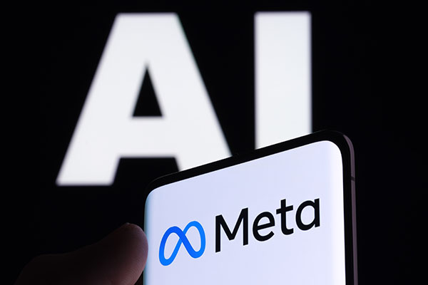 Logotipo de Meta visto en un smartphone y letras de IA en el fondo. Concepto para Meta, la inteligencia artificial de Facebook.